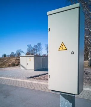 Two light gray transformer boxes Stock Photos