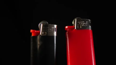 Two lighters accelerated close-up shooting. Inspection of lighters Stock Footage 229019022