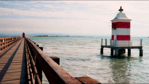 Two Lighthouses on the Bridge in Lignano at Sunset Stock Footage 118828607