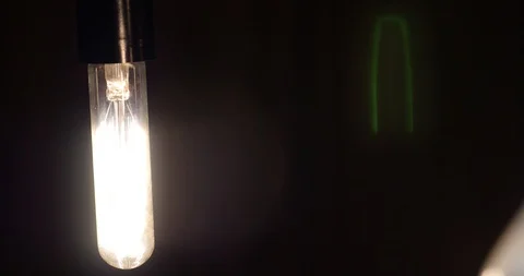 Two Lighting Bulbs Stock Footage 97816192