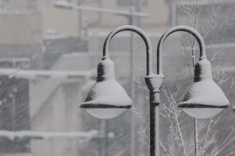 Two lights in a snowstorm Stock Photos