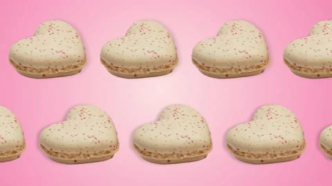 Two lines with Heart shaped macarons pastel white colors animated. 4k Stock Footage 168329368
