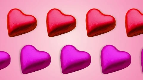Two lines with many candy in the shape of a heart animated. Valentine's Day Video stock 168330070