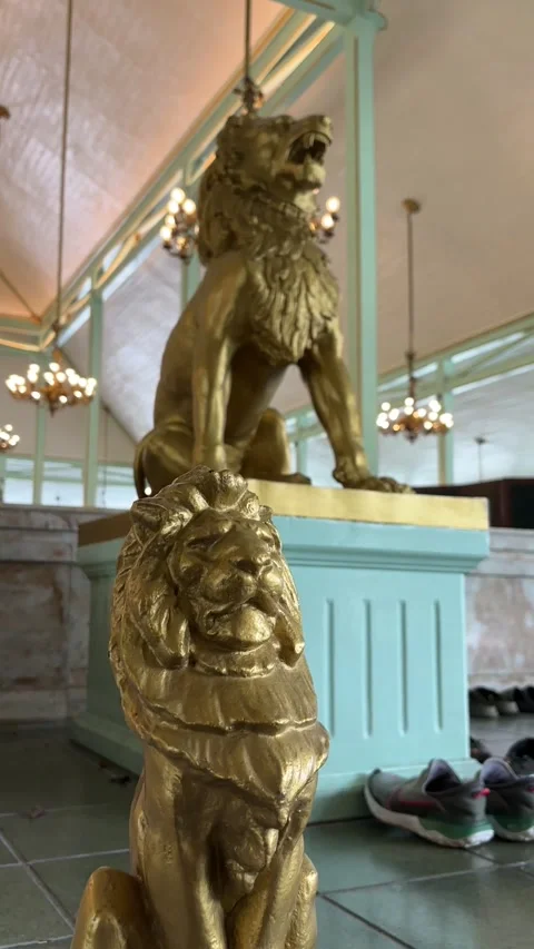Two lion statues are at the top and bottom in gold Stock Footage 322978599