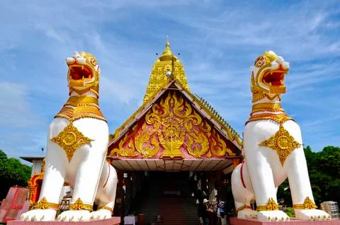 Two lion statues guard Stock Photos