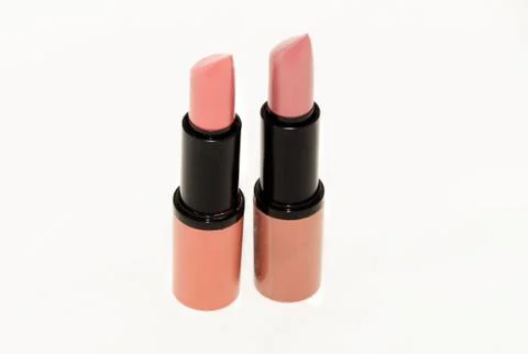 Two lipstick open on white background Stock Photos