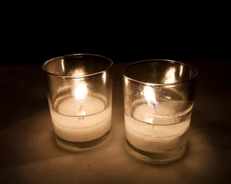 Two lit candles Stock Photos