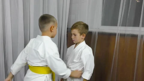 Two little athletes doing double throw grapple exercises Stock Footage 167873851