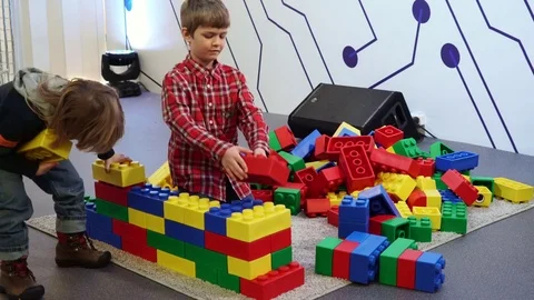 Two little brothers playing with constructor. Stock Footage 73927540