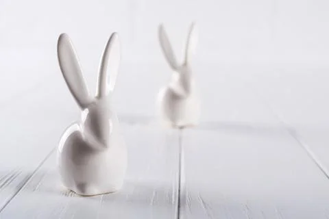 Two little easter bunny. One color minimal concept on white background Stock Photos