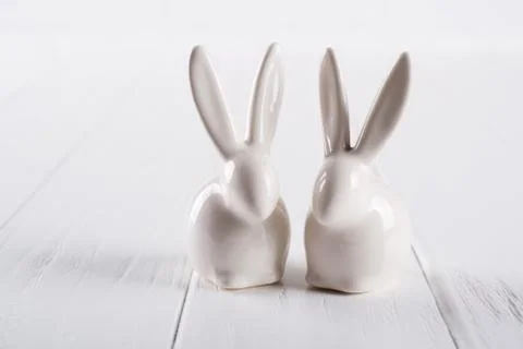 Two little easter bunny. One color minimal concept on white background Stock-Fotos
