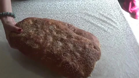 Two loaves of bread on the table Video stock 308368414