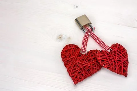 Two locked hearts Stock Photos