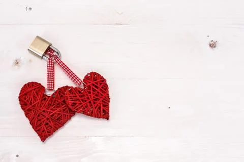 Two locked hearts Stock Photos