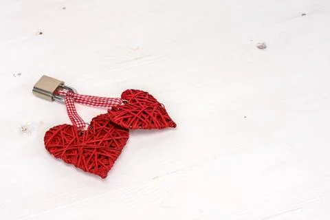 Two locked hearts Stock Photos