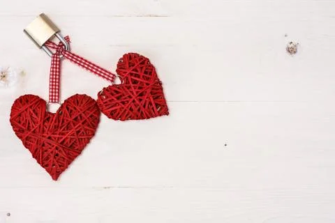 Two locked wicker hearts Stock Photos