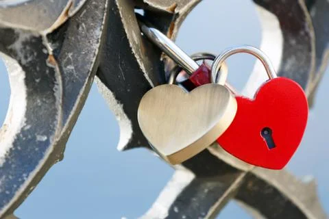 Two locks in the shape of a heart. Place for text. Concept of eternal love Stock Photos