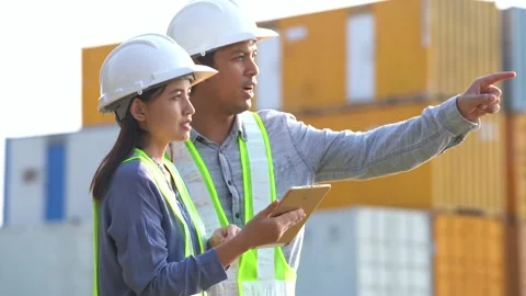 Two logistic staff checking and control ... | Stock Video | Pond5