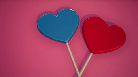 Two lollipops. Blue and Red hearts. Candy. Love concept. Stock Footage 122832085