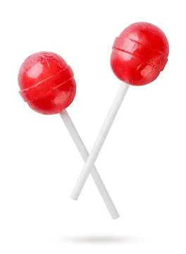 Two lollipops flying on a white background. Isolated Stock Photos