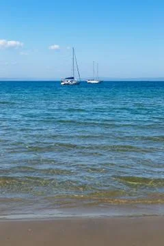 Two lonely yachts Stock Photos