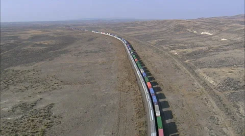 Two Long Freight Trains Passing Stock Footage 65439857