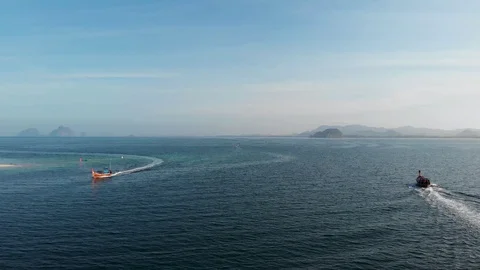 Two longtail boats cross their path Video stock 103711468