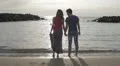 two lovers chase (run after) and kissing in the sea - beach - love - sunset HD Footage