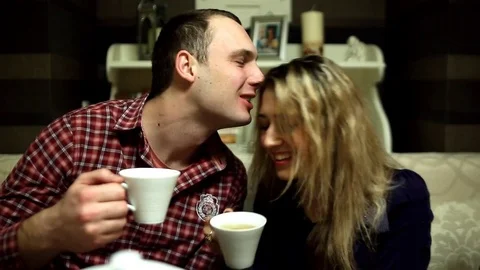 Two lovers drink tea in the restaurant Stock Footage 77521643