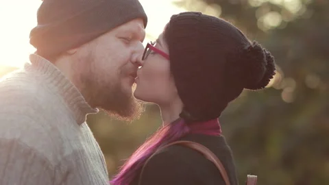 Two lovers embracing and petting each other. happy young couple kissing during Stock Footage 144436745