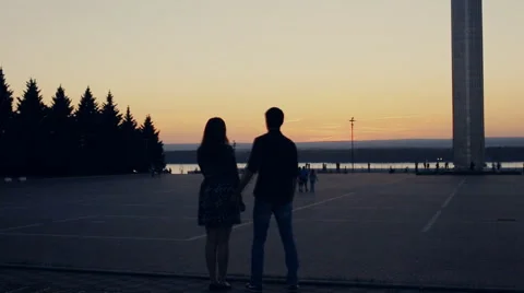 Two lovers looking in city into the distance Stock Footage 65595981