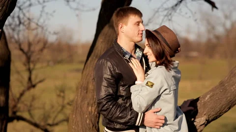 Two lovers spend time together in nature, in a romantic atmosphere Stock Footage 89979565