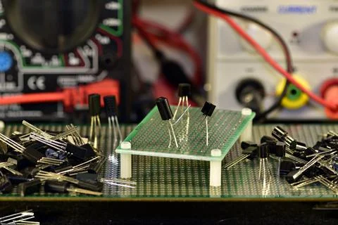 Two low-power silicon transistors in a plastic case do boxing or fencing on a Stock Photos