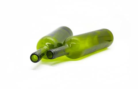 Two lying empty wine bottles on a white background Stock Photos