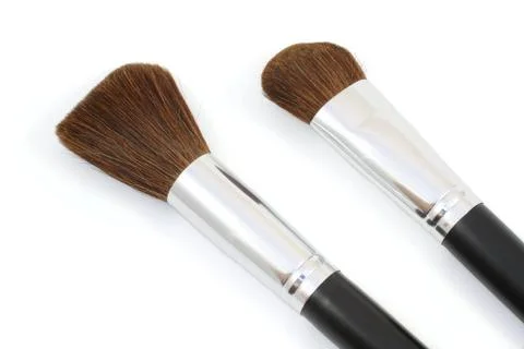 Two make-up brushes isolated on white background Stock Photos