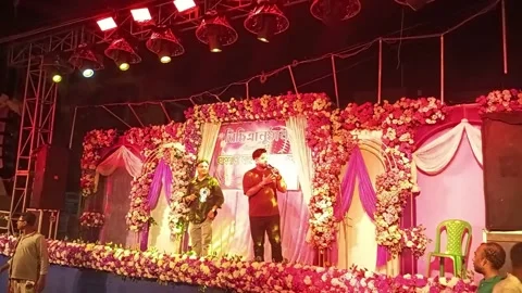 Two Male Artists Performing Live Duet on Decorated Cultural Festival Stage Stock Footage 338400487