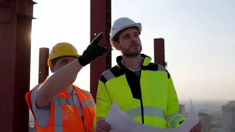 Two male builders engineers men, contractor investor worker foreman architect in Stock Footage 130503030