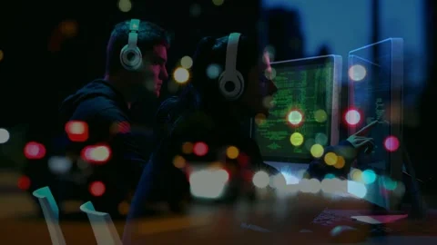 Two male devs spotting bug, pointing at monitors in night lab, debugging code Stock Footage 332545197