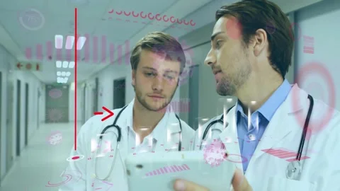 Two male doctors using tablet in hospital hallway, showing animated bar charts Stock Footage 330337309