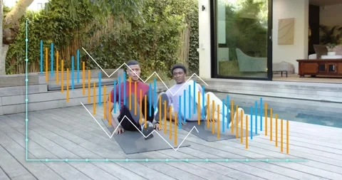 Two male friends engaging flutter kicks as music playing, animated graphs Stock Footage 318142572