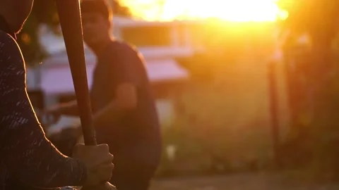 Two male friends practicing baseball Stock Footage 231562587