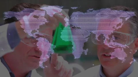 Two male lab engineers holding green pyramid sample, rotating and examining Stock Footage 328469380