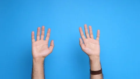Two male screen on a blue background waiving Stock Footage 91319957