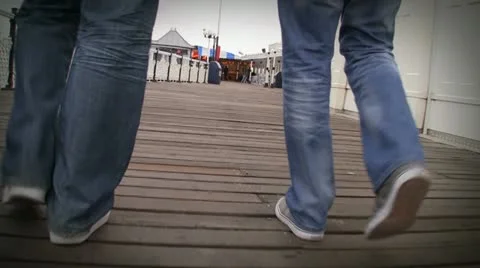 Two males walks on deck Stock Footage 11516729