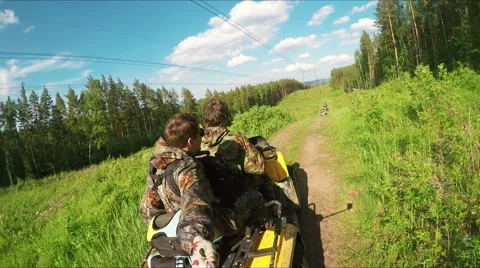 Two Man on ATV in forest video Selfe 스톡 동영상 57707273