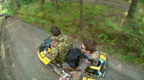 Two Man on ATV in forest video Selfe Stock Footage 57707512