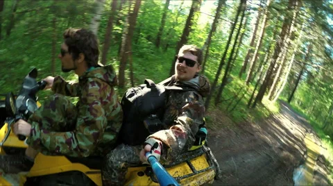 Two Man on ATV in forest video Selfe Stock Footage 57708268