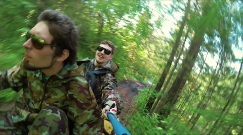 Two Man on ATV in forest video Selfe Stock Footage 57708375