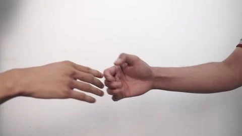 Two Man Greet Each Other Giving Each Other Their Hand. Fist Bump.  Friend Stock Footage 219303536
