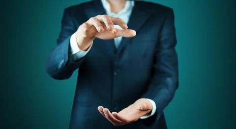 Two  man hands isolated on dark background Stock Photos